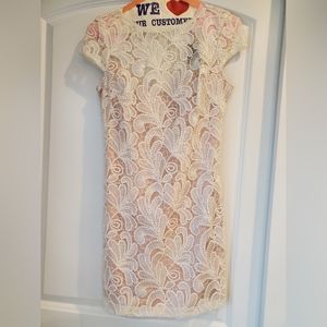 BEBE| Women’s white/cream lace dress| size 4, white underlay, classy and sexy